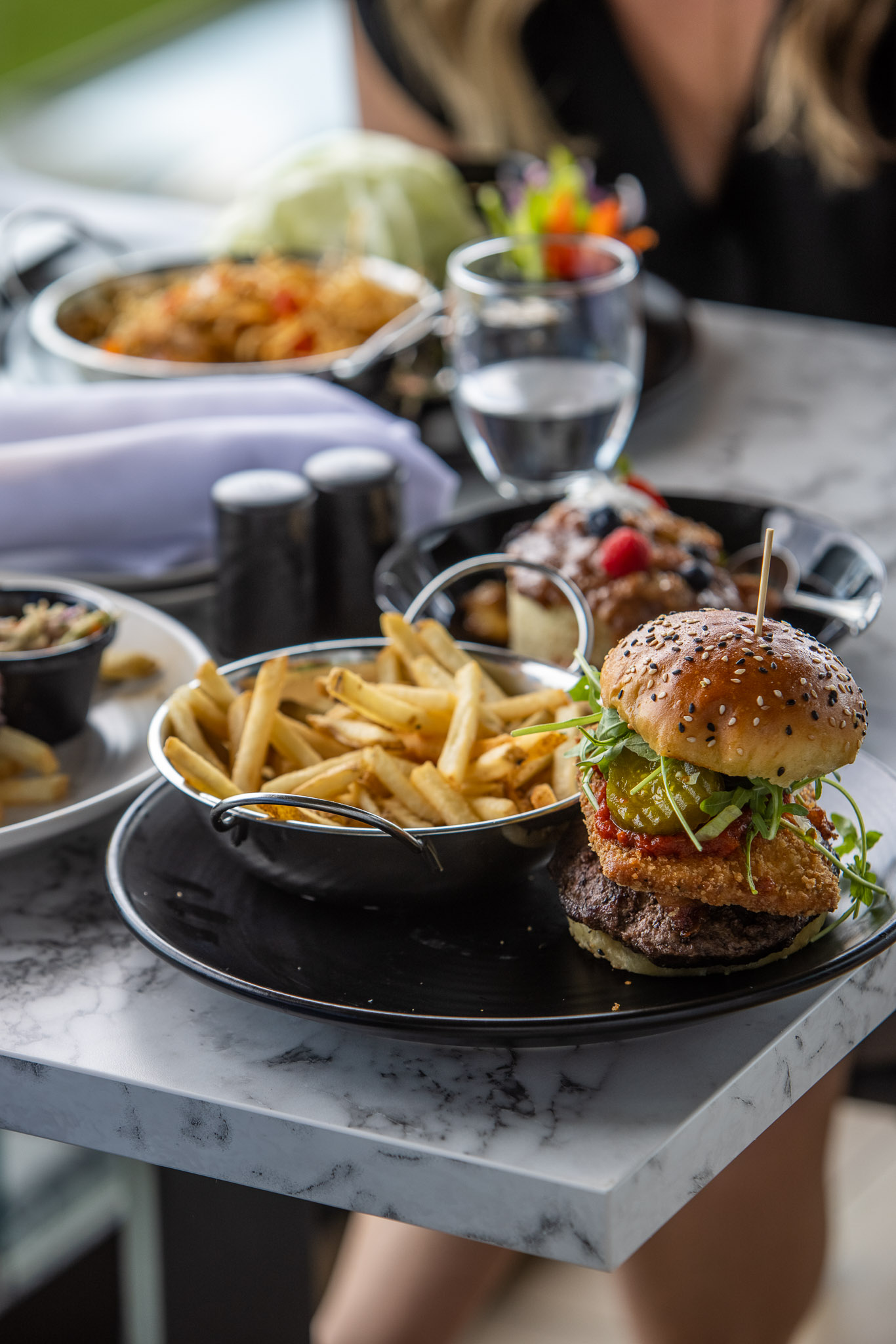 hamburger and fries on the stella artois terrace
